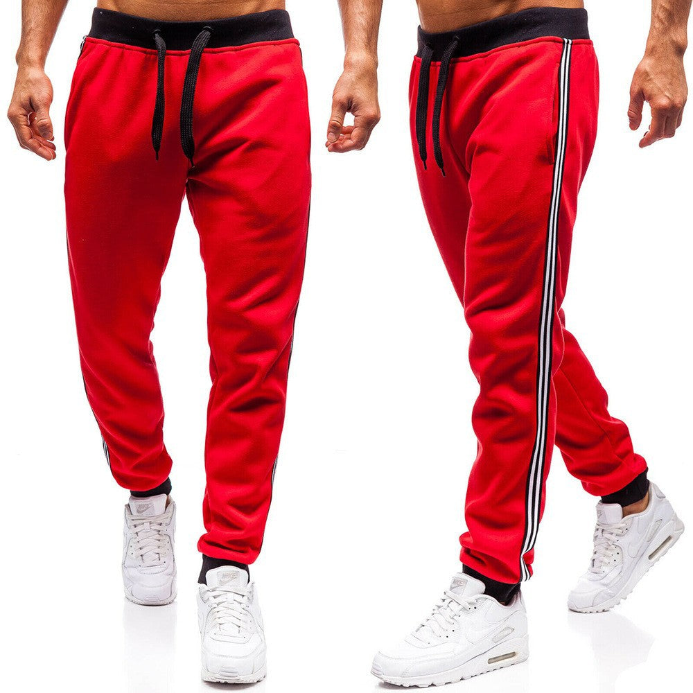 Men's sporty sweatpants with side stripes Skorter