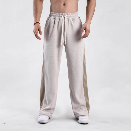 Men's sporty leisure pants with side ventilation openings and elastic waistband Skorter