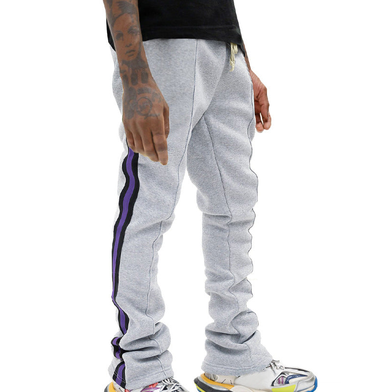 Men's sporty sweatpants with side stripes and adjustable waistband Skorter