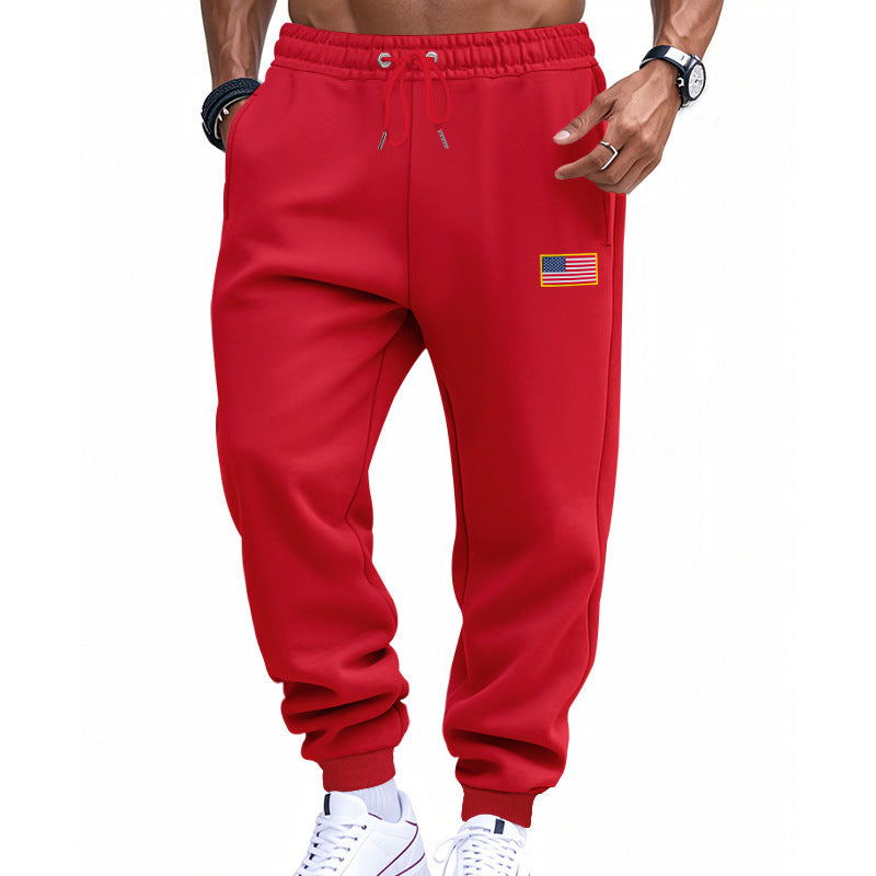 Men's sporty sweatpants with elastic waistband and practical side pockets Skorter