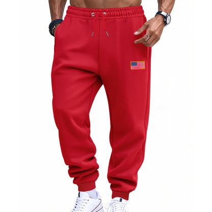 Men's sporty sweatpants with elastic waistband and practical side pockets Skorter