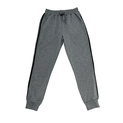 Men's sporty jogging pants with practical pockets and contrast stripes Skorter