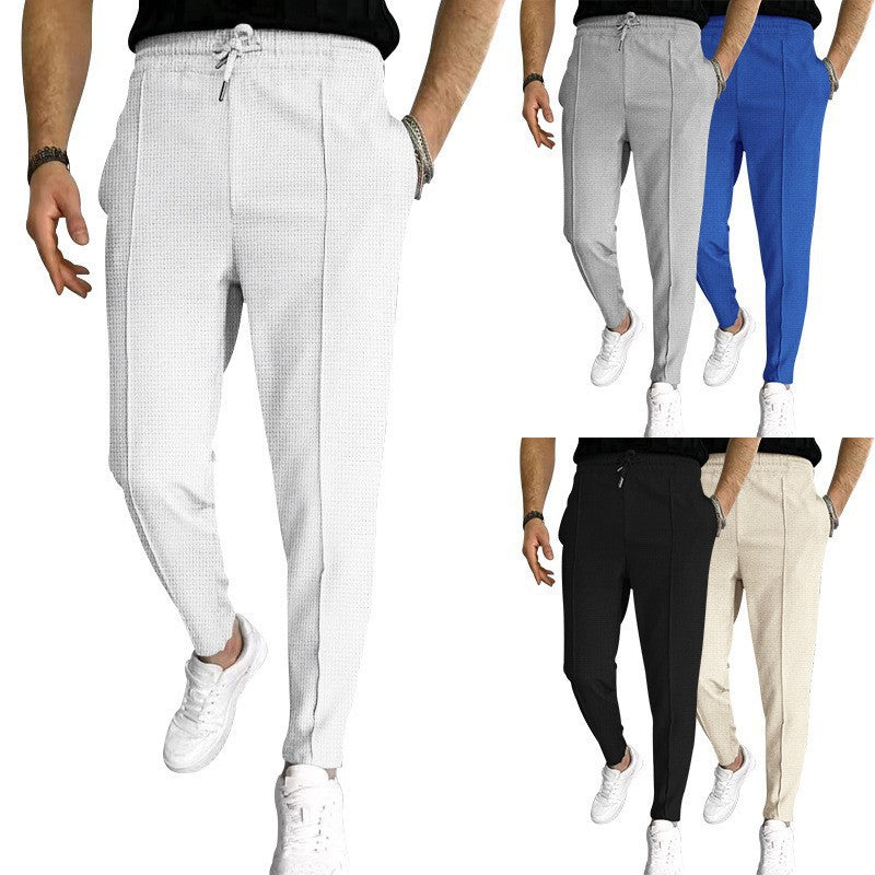 Men's stylish high-waisted pants with elastic drawstring and textured design Skorter