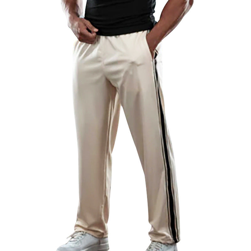Men's sporty training pants with side stripes Skorter