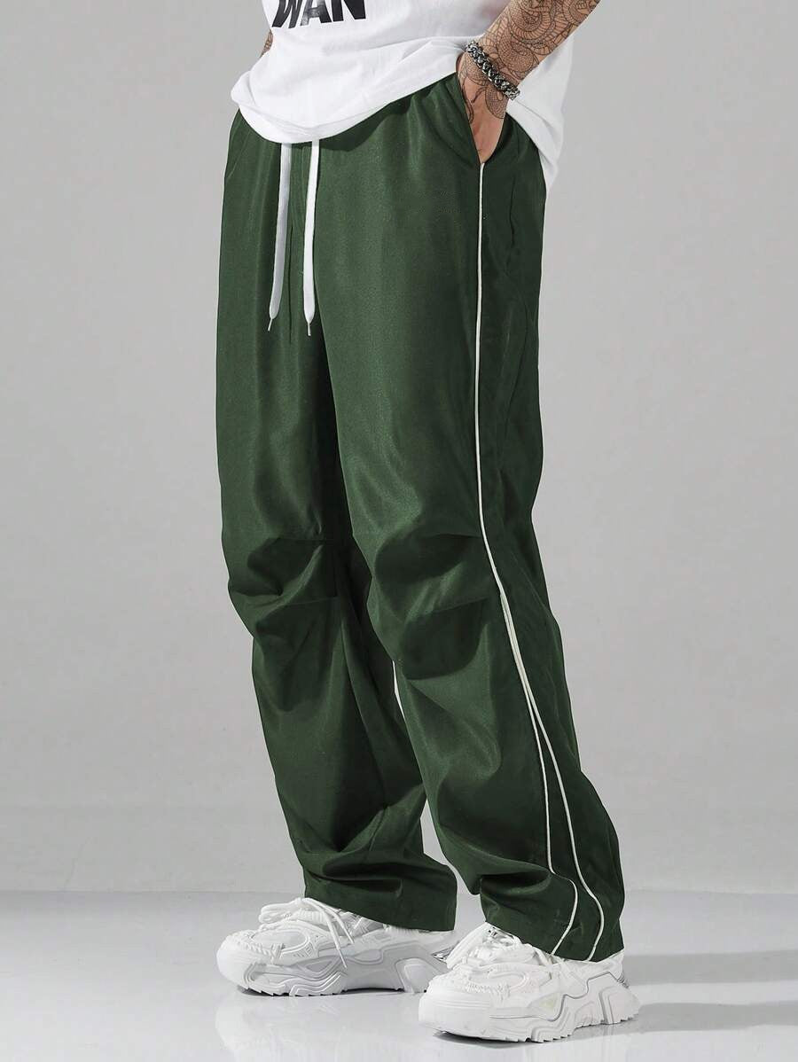 Men's casual sports pants with elastic waistband and side seams Skorter