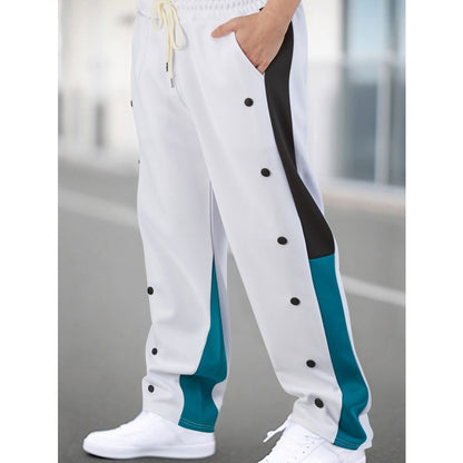 Men's sporty training pants with snap button closure and breathable structure Skorter