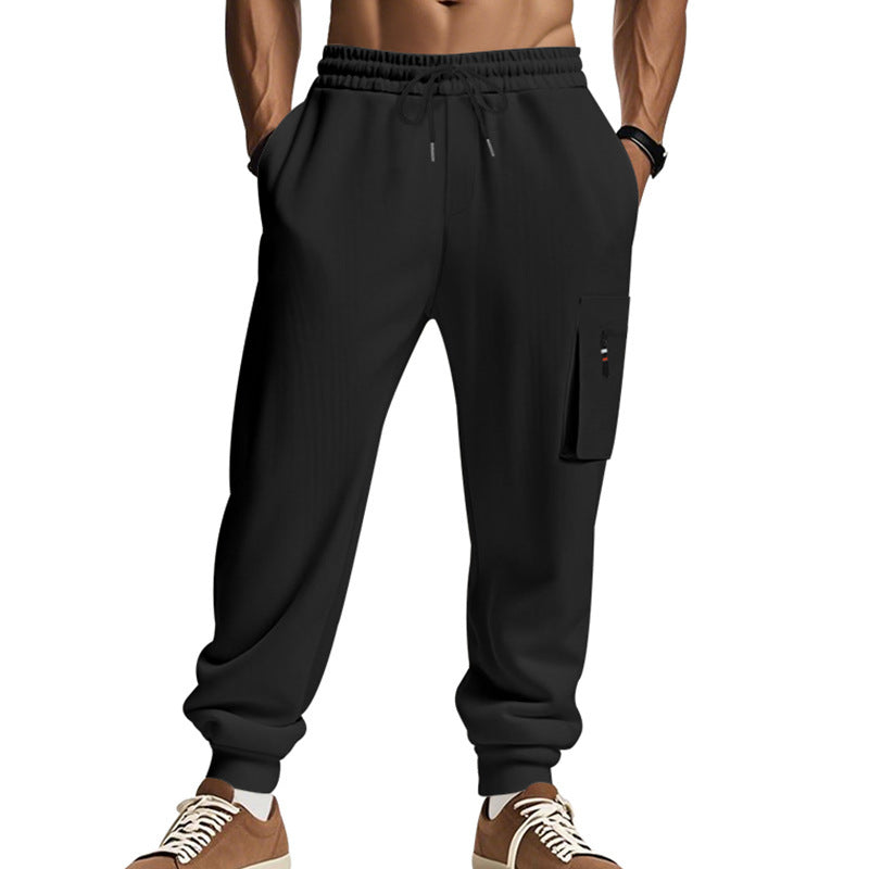 Men's sporty jogging trousers with practical side pockets and adjustable waistband Skorter