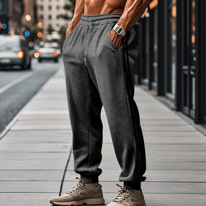 Men's sporty training pants with side stripes Skorter