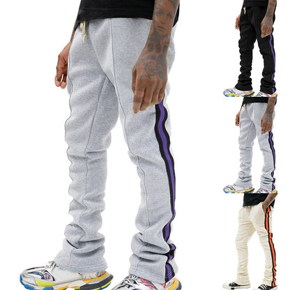 Men's sporty sweatpants with side stripes and adjustable waistband Skorter