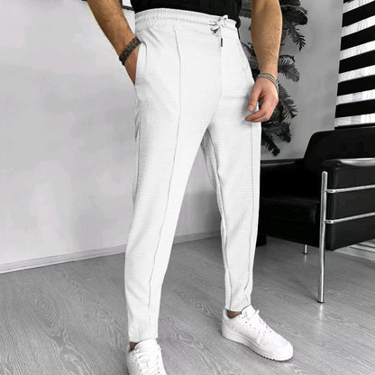 Men's stylish high-waisted pants with elastic drawstring and textured design Skorter