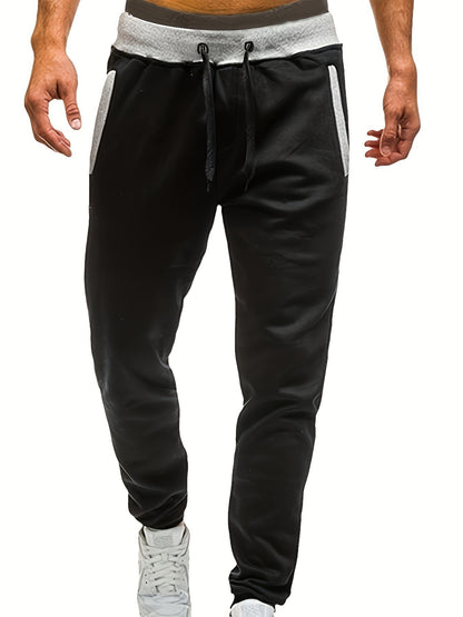 Men's sporty sweatpants with elastic waistband and side pockets Skorter