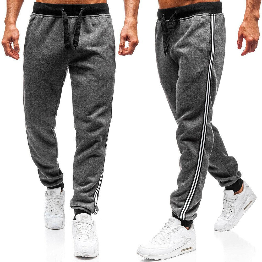 Men's sporty sweatpants with side stripes Skorter