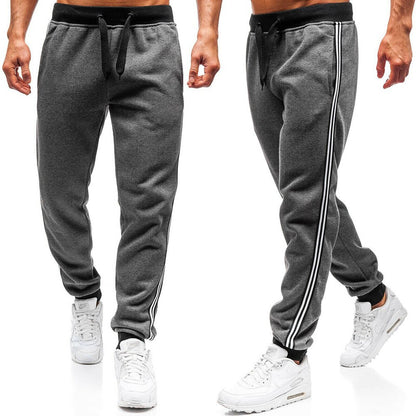 Men's sporty sweatpants with side stripes Skorter