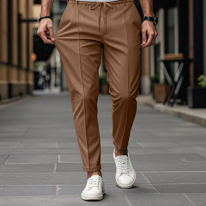 Men's stylish sports trousers with elastic waistband and practical side pockets Skorter