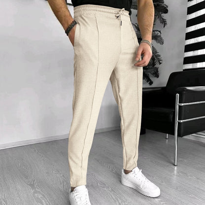 Men's stylish high-waisted pants with elastic drawstring and textured design Skorter