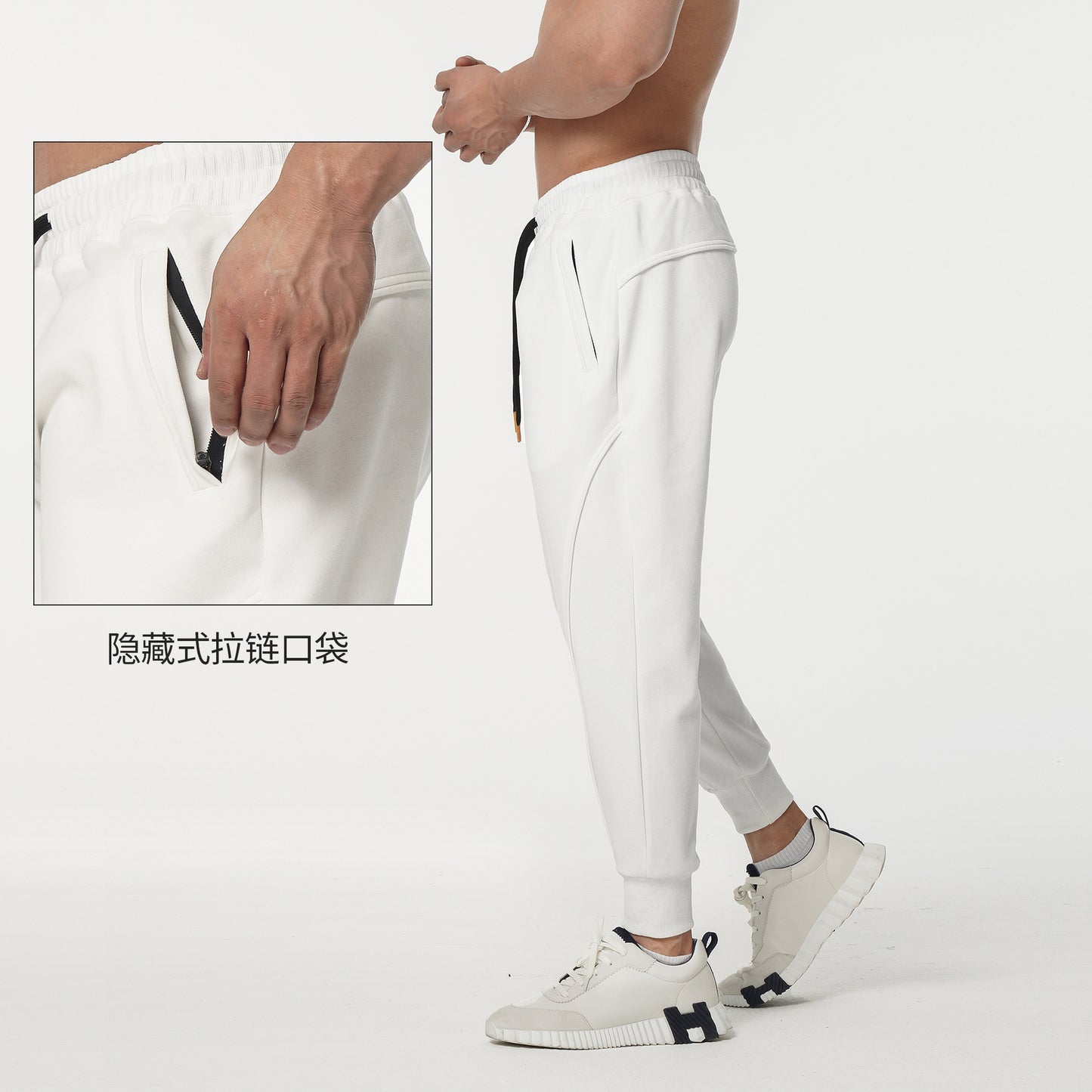 Men's sporty sweatpants with elastic waistband and side zip pockets Skorter