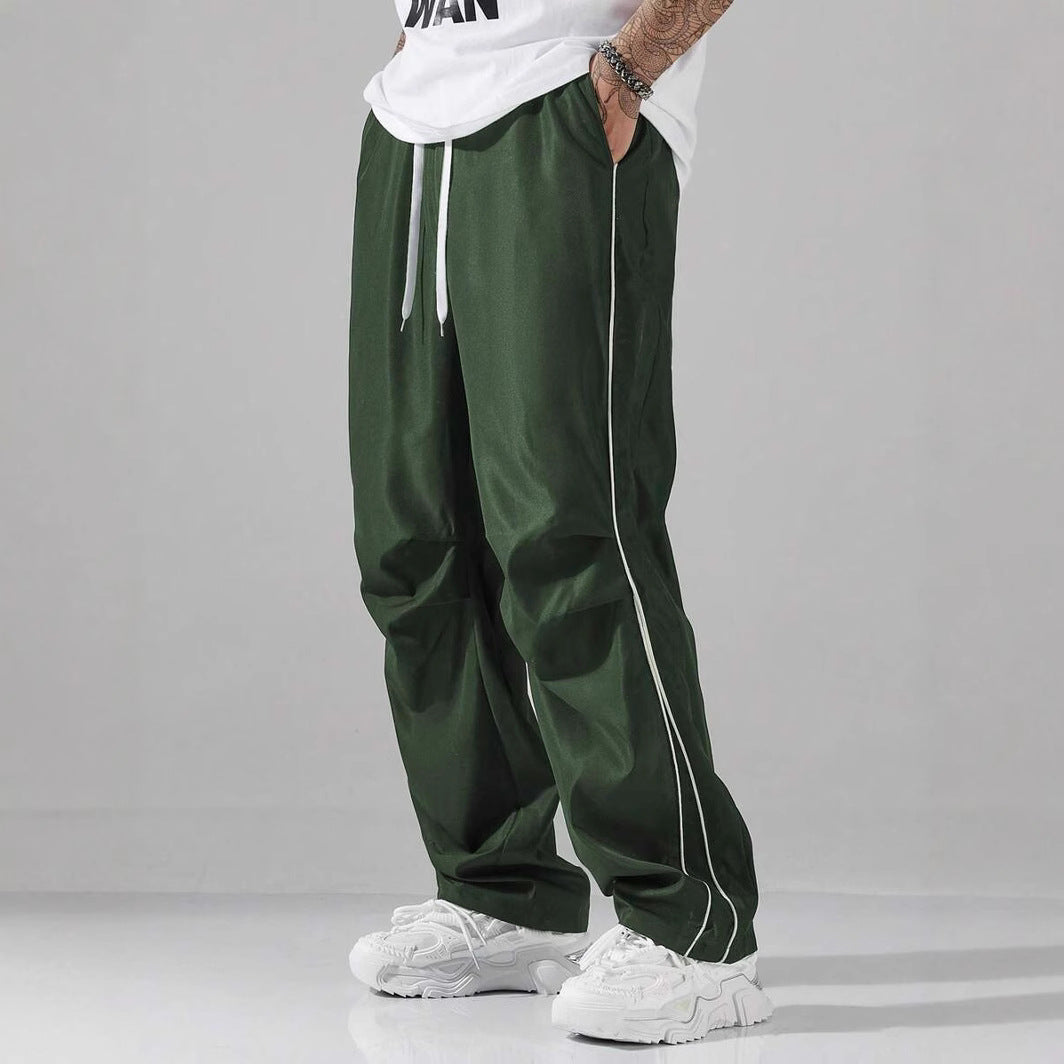 Men's sporty leisure trousers with side contrast stripes and adjustable waistband Skorter