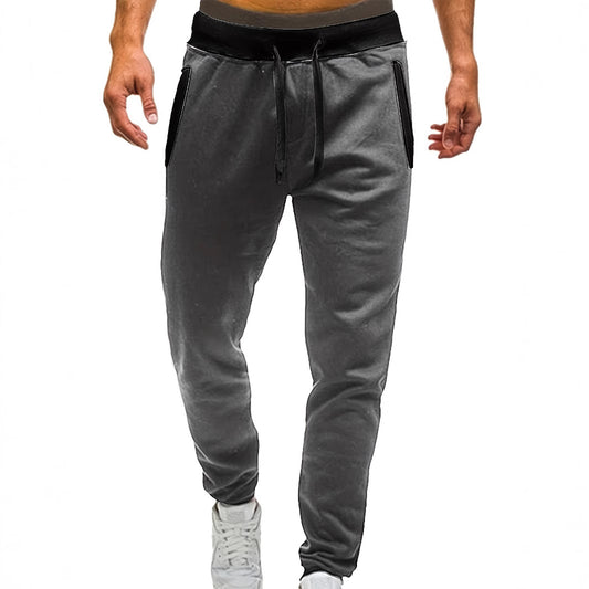 Men's sporty jogging pants with incorporated side pockets and adjustable drawstring Skorter