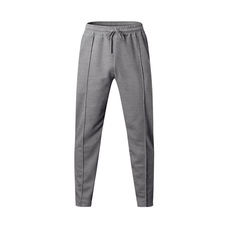 Men's sporty jogging pants with elastic waistband and side inserts Skorter