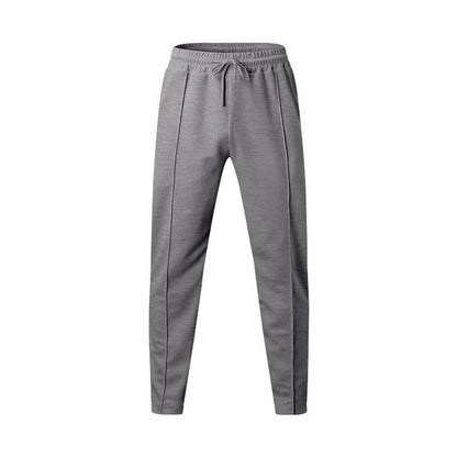 Men's sporty jogging pants with elastic waistband and side inserts Skorter