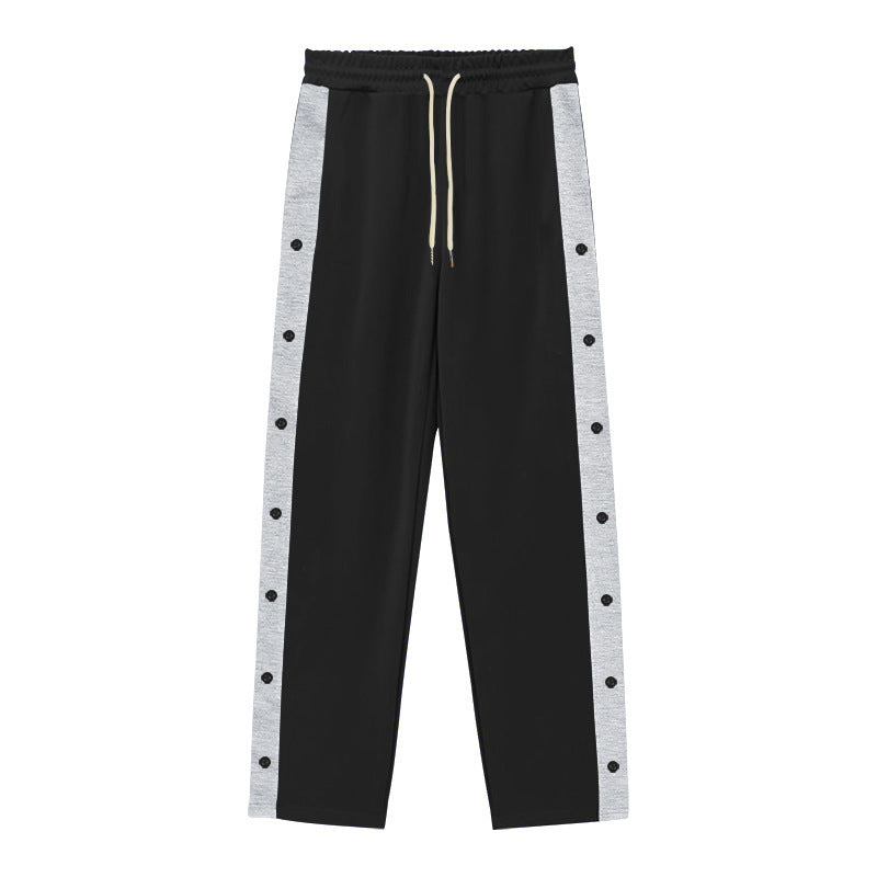Men's sporty training pants with button design and elastic waistband Skorter