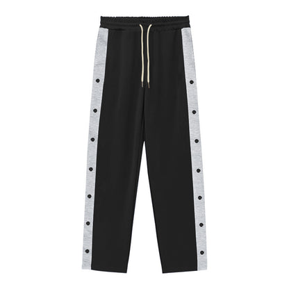Men's sporty training pants with button design and elastic waistband Skorter