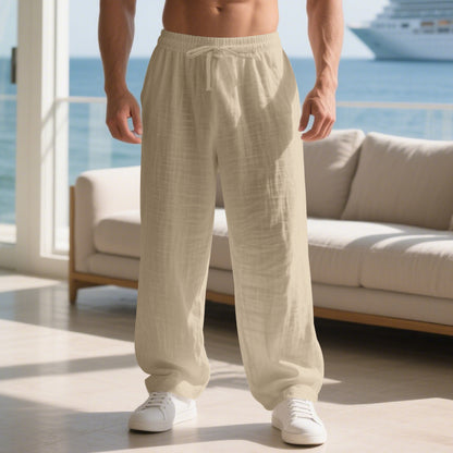 Men's relaxed linen trousers with elastic waistband and loose fit Skorter