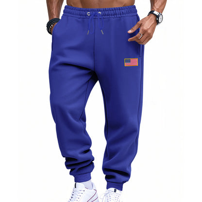 Men's sporty sweatpants with elastic waistband and practical side pockets Skorter