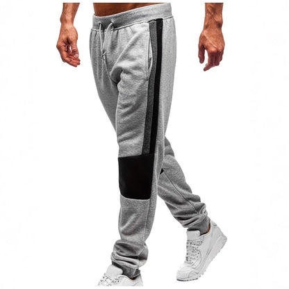 Men's sporty sweatpants with color block design and elastic waistband Skorter
