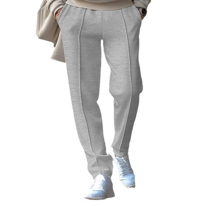 Men's sporty jogging pants with elastic waistband and side inserts Skorter