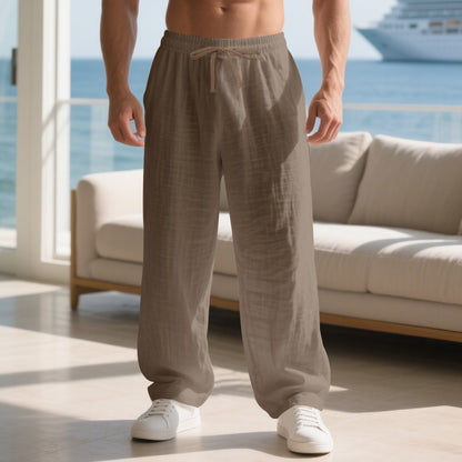 Men's relaxed linen trousers with elastic waistband and loose fit Skorter