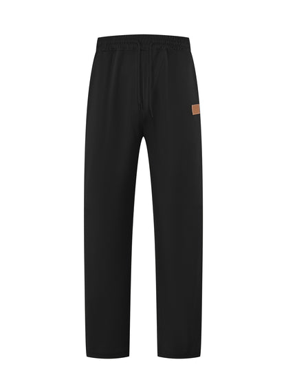 Men's Sporty Jogging Pants with Elastic Waistband and Practical Pockets Skorter