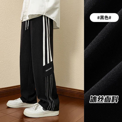 Men's sporty casual pants with modern side details Skorter