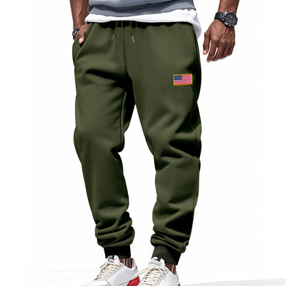 Men's sporty sweatpants with elastic waistband and practical side pockets Skorter