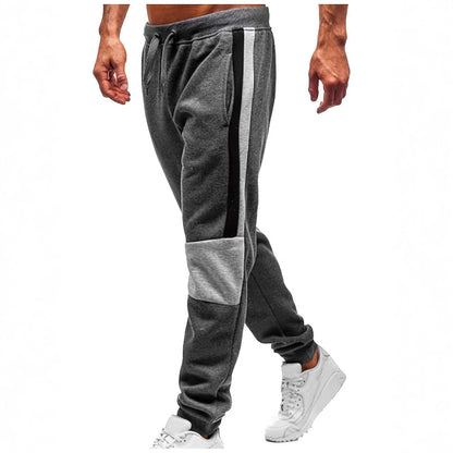 Men's sporty sweatpants with color block design and elastic waistband Skorter