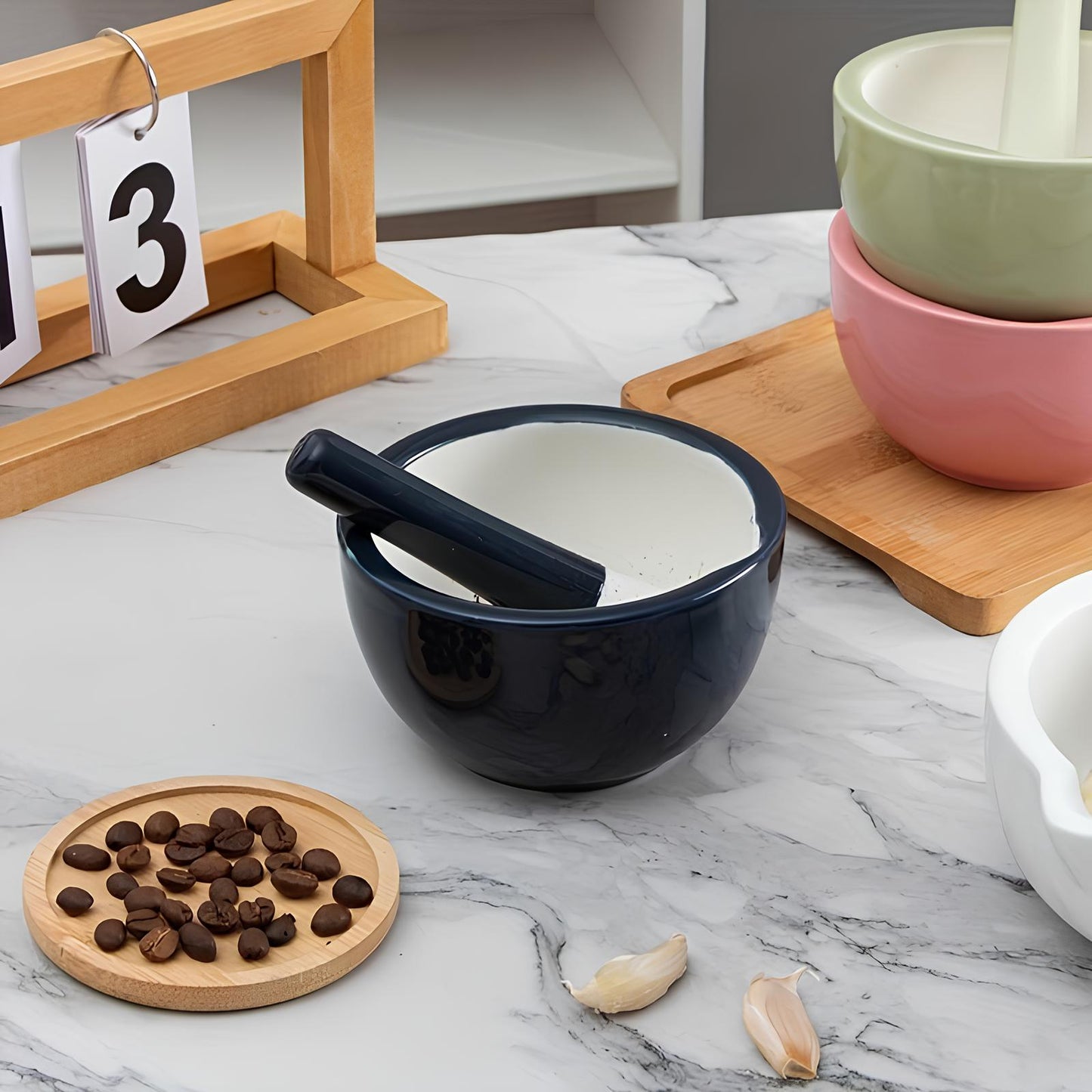 Skorter and a ceramic kitchen pestle