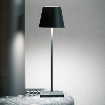 Skorter | PoldLight – Modern LED Table Lamp with Charging Capability