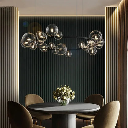 Skorter | Modern creative metal chandelier lighting: 7/10 clear glass bubbles, long round design with G9 light socket