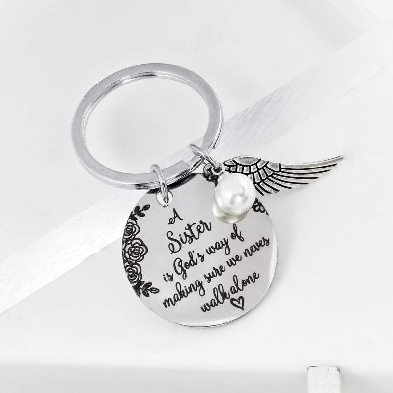 Skorter | A sister is God's way of making sure we never walk alone keychain