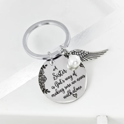Skorter | A sister is God's way of making sure we never walk alone keychain