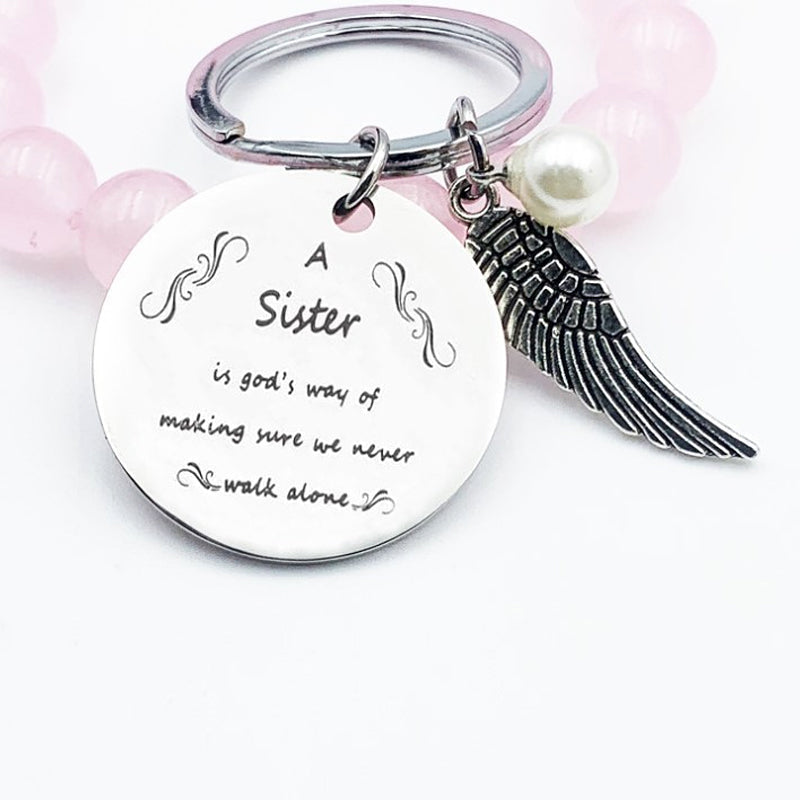 Skorter | A sister is God's way of making sure we never walk alone keychain