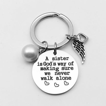 Skorter | A sister is God's way of making sure we never walk alone keychain