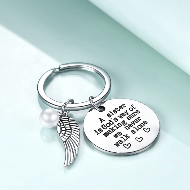 Skorter | A sister is God's way of making sure we never walk alone keychain