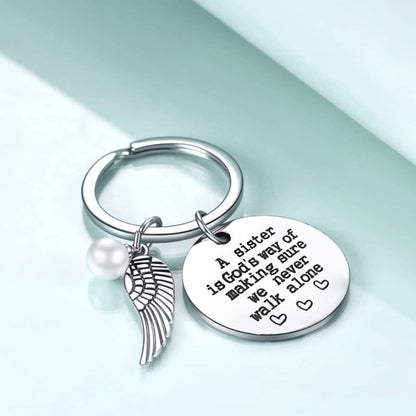 Skorter | A sister is God's way of making sure we never walk alone keychain