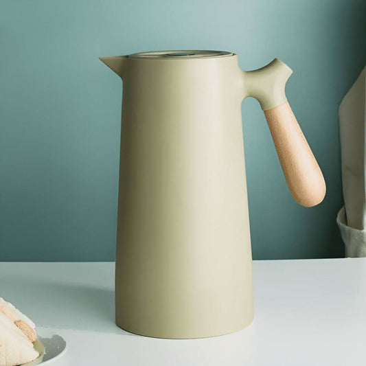 Skorter | Elegant double-walled glass carafe with wooden handle for hot and cold drinks