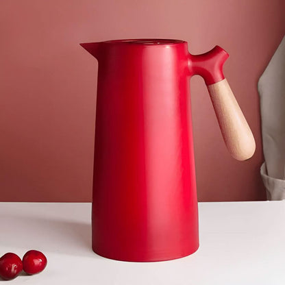 Skorter | Elegant double-walled glass carafe with wooden handle for hot and cold drinks
