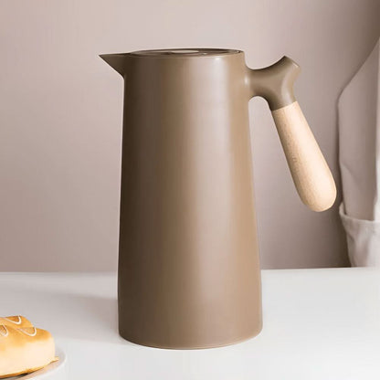 Skorter | Elegant double-walled glass carafe with wooden handle for hot and cold drinks