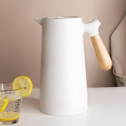 Skorter | Elegant double-walled glass carafe with wooden handle for hot and cold drinks