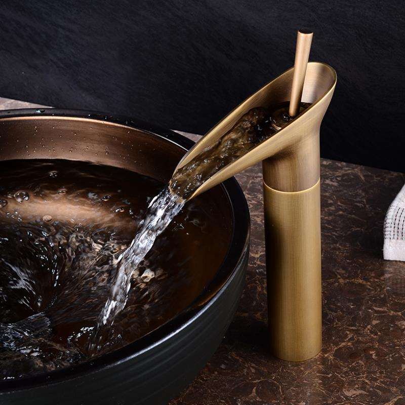 Skorter | AquaFalls – Antique Waterfall Basin Faucet in Brass with Bronze Finish