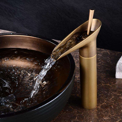 Skorter | AquaFalls – Antique Waterfall Basin Faucet in Brass with Bronze Finish
